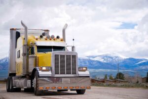 yellow truck on the highway